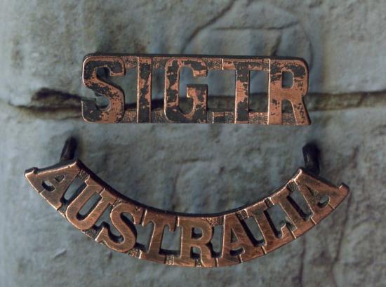 CAP BADGES .